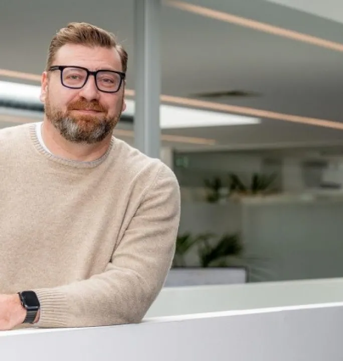 Sammy Colson standing in the Springbok Office at Mechelen
